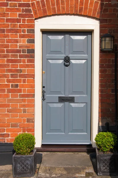 Wooden front door of an English house — Stock Photo, Image