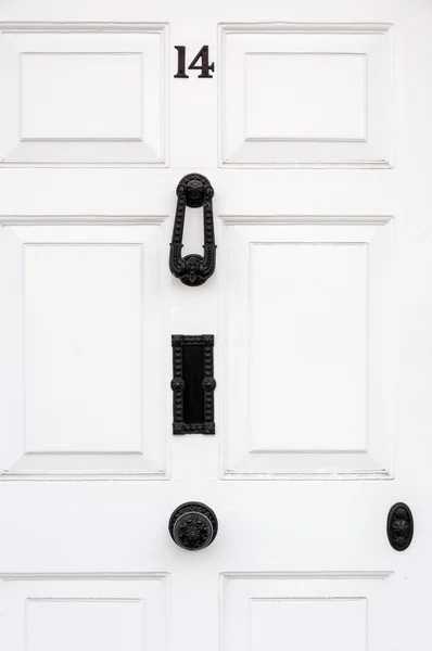 Fechar de uma porta branca número 14 — Fotografia de Stock