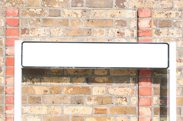 Blank Street Sign against Brick Wall — Stock Photo, Image