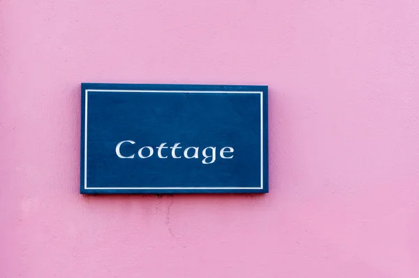 Sign for 'Cottage' engraved on a tile — Stock Photo, Image