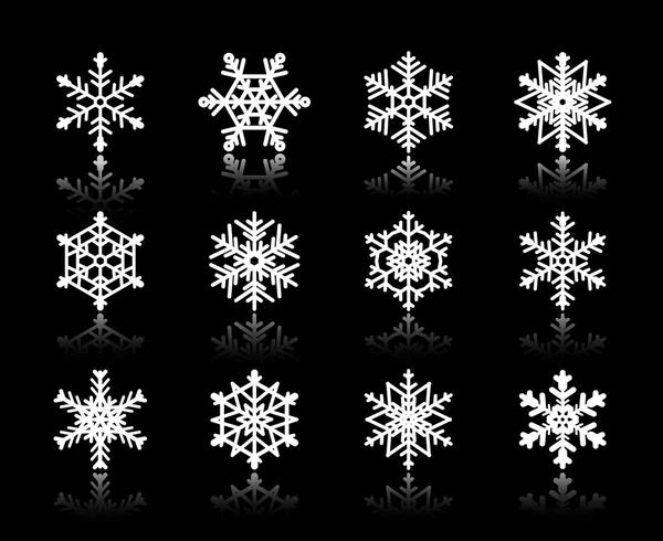 Copos de nieve blancos sobre fondo negro . — Vector de stock