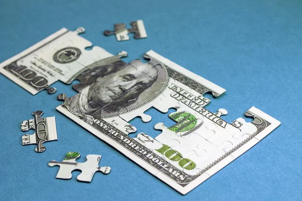 Cento dollari in forma di puzzle. Concetto — Foto Stock