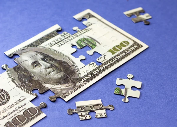 Dollari puzzle. Concetto di finanza e risparmio — Foto Stock