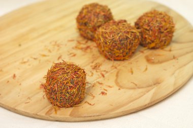 East sweets. Fruit candies sprinkled with saffron