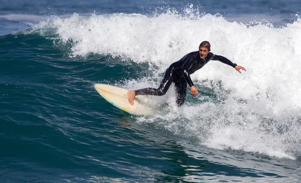 Surfers in action — Stock Photo, Image