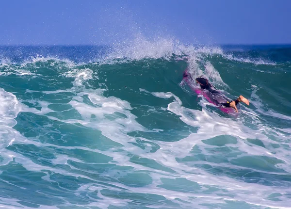 Surfers in action — Stock Photo, Image