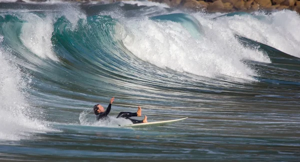 Surfers in actie — Stockfoto