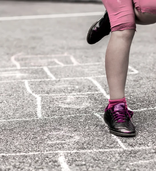 Child on the hopscotch — Stock Photo, Image