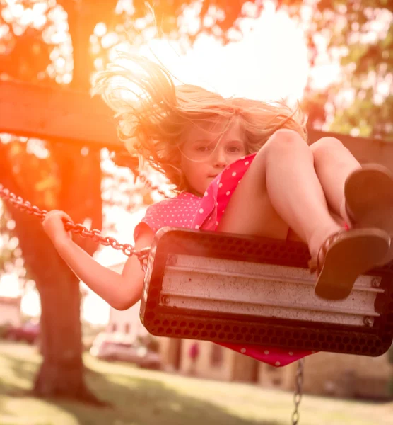 Girl on a swing — Stock Photo, Image