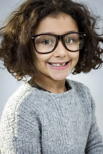 Petite fille en lunettes Image En Vente