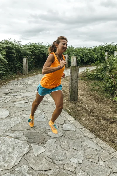 Leichtathletin läuft — Stockfoto