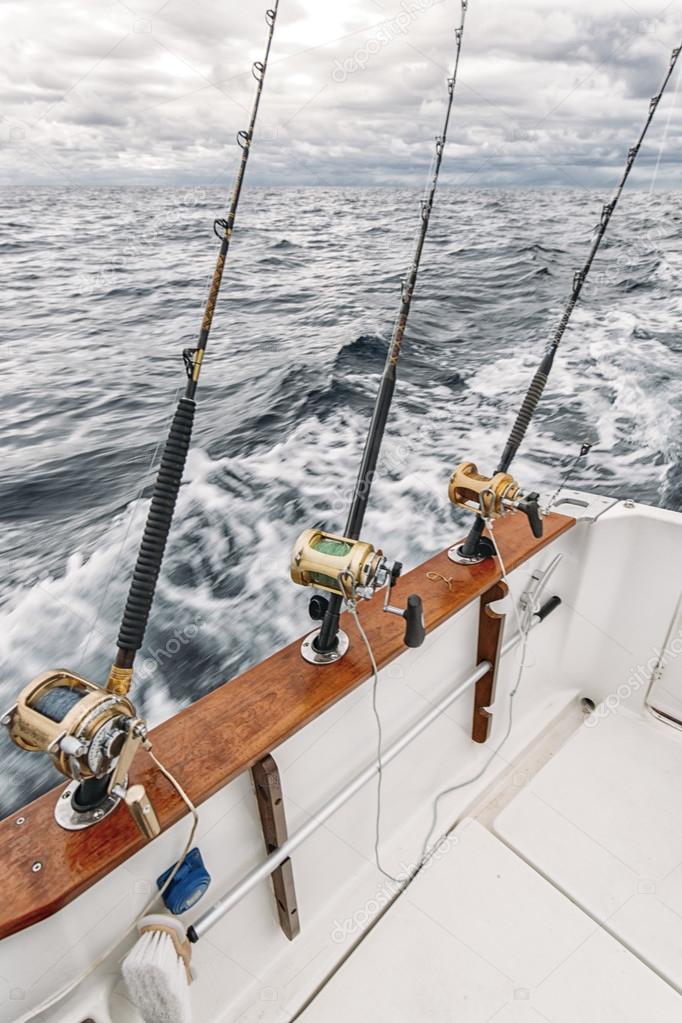 Fishing rods on a tuna fishing boat — Stock Photo © MarcoGovel #86402470