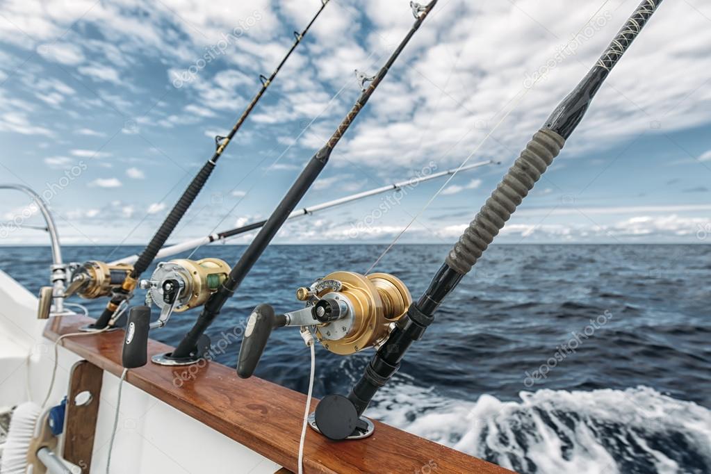 Fishing rods on a tuna fishing boat — Stock Photo © MarcoGovel 86402504