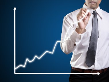 iş adamı el bir grafik çizimi 