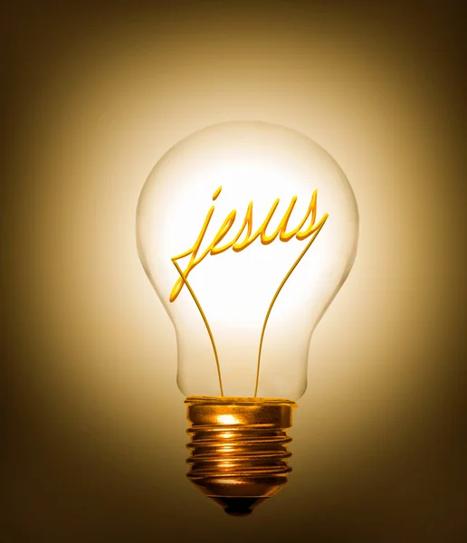 Lightbulb with the word jesus as filament — Stock Photo, Image