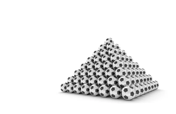 Pyramide aus Fußbällen — Stockfoto