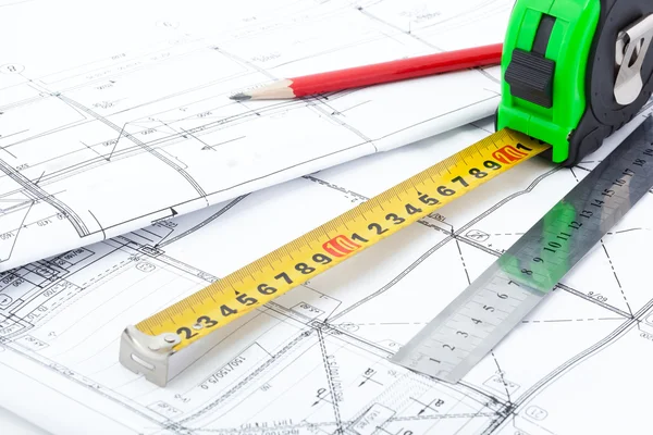 Architectural drawings and measurement tools. Stock Picture