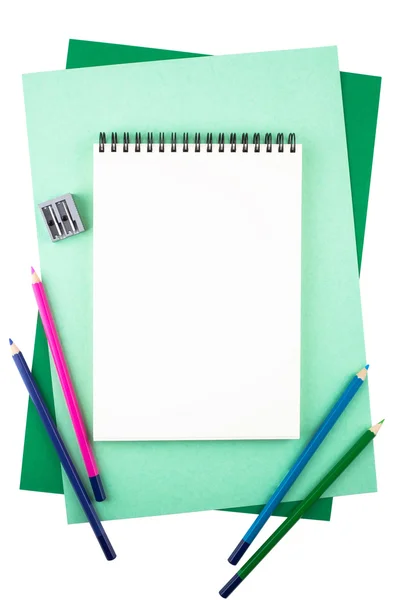 Notebook on sheets of colored textured paper imitating a frame. — Stock Photo, Image