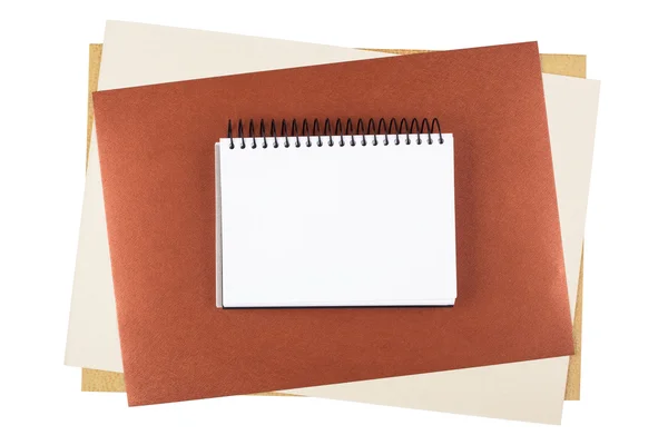 Notebook na tvarovaných papíru. — Stock fotografie