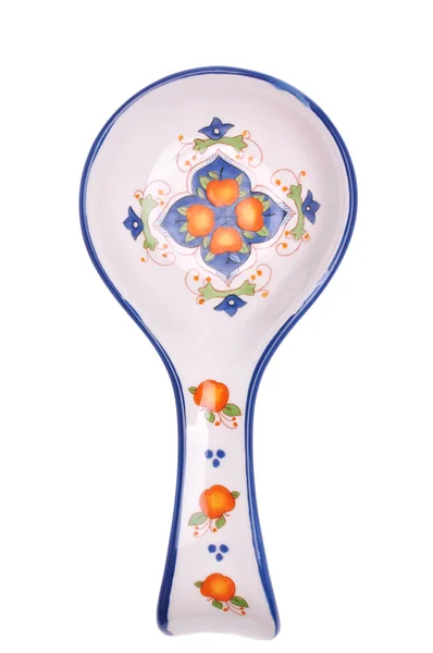 Süs kaşık dinlenme, beyaz arka plan üzerinde izole şablonlar, yemek pişirmek için. Mutfak aksesuarları.