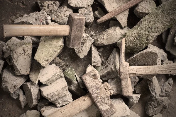 Concrete rubble debris with hammer — Stock Photo, Image