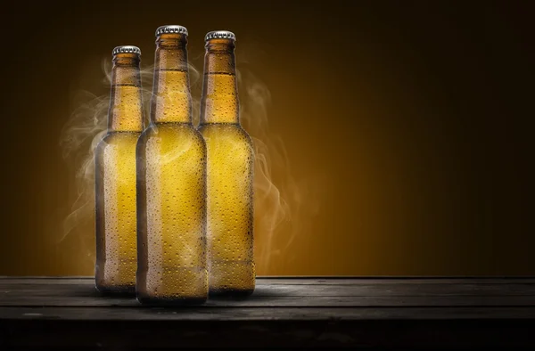 Tre flaskor öl — Stockfoto