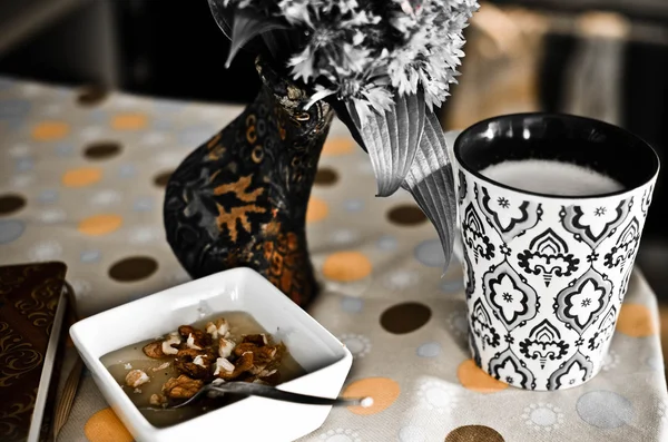 Cup of hot coffee, flowers and book. Romantic background with retro filter effect — Stock Photo, Image