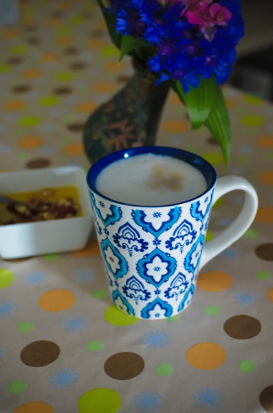 Cup of hot coffee, flowers and book. Romantic background with retro filter effect — Stock Photo, Image