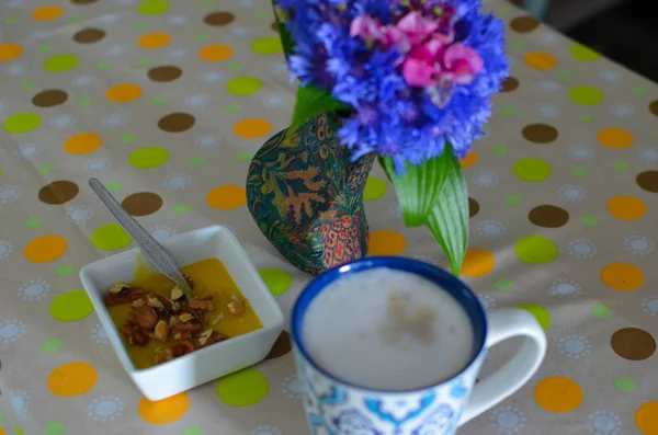 Cup of hot coffee, flowers and book. Romantic background with retro filter effect — Stock Photo, Image