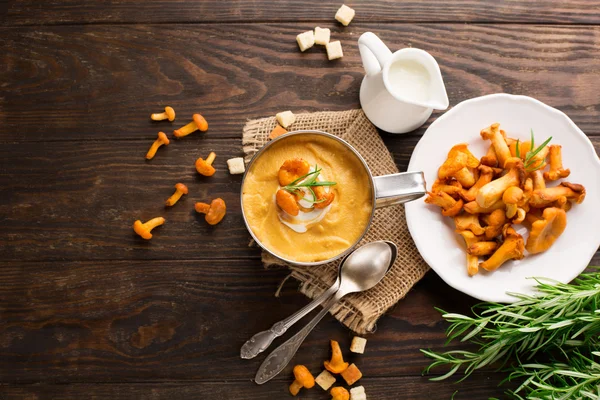 Soup with chanterelles and herbs — Stock Image Soup with chanterelles and herbs Royalty Free Stock Images