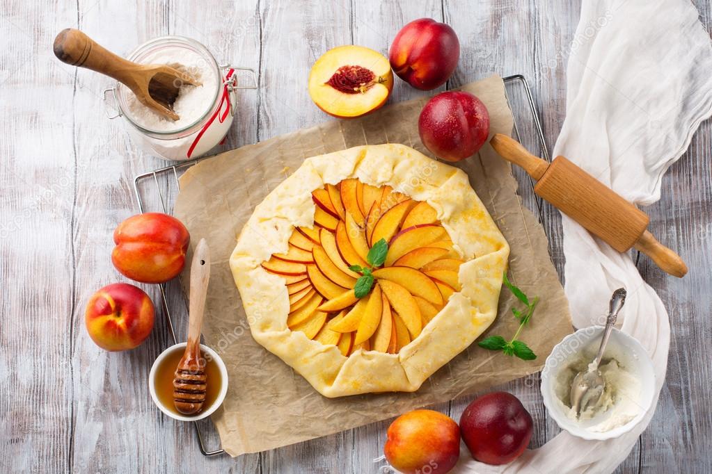 Homemade pie with fruits ready for baking