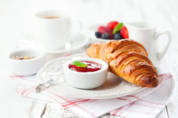 Fresh croissant with jam — Stock Photo, Image