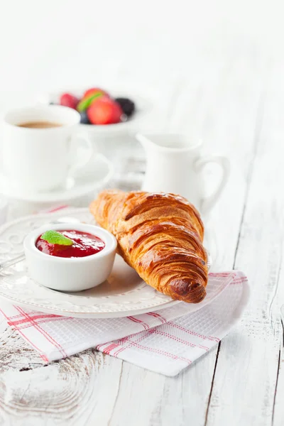 Fresh croissant with jam — Stock Photo, Image