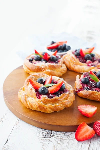 Tasty buns with berries — Stock Photo, Image