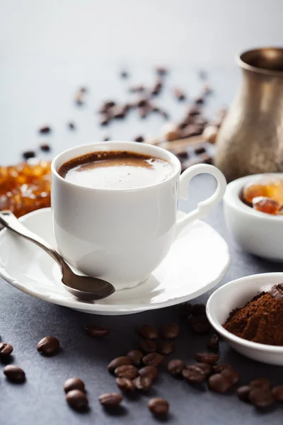 Coffee cup and beans