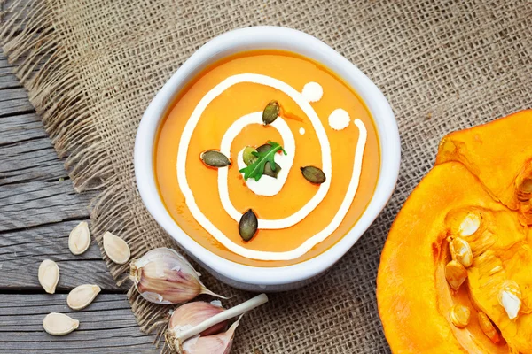 Pumpkin soup with garlic and fresh cream — Stock Image Pumpkin soup with garlic and fresh cream Stock Image