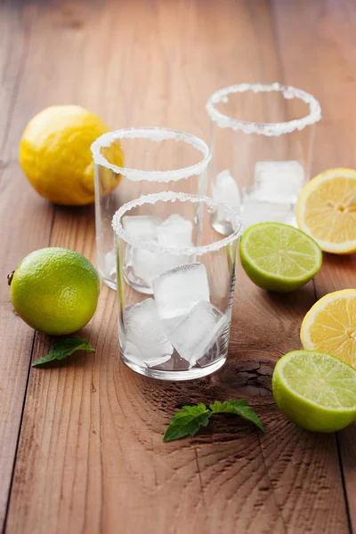 Ingredients for lemonade - lemons, limes and mint — Stok fotoğraf