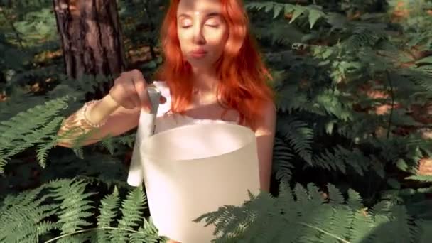 Red Haired Woman Playing White Quartz Crystal Singing Bowls Forest — Wideo stockowe