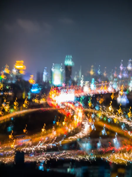Luz abstracta y el color de la ciudad y el transporte en la noche —  Fotos de Stock