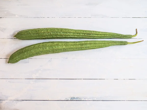 Ridge Gourd White Wooden Background — Stock Photo, Image