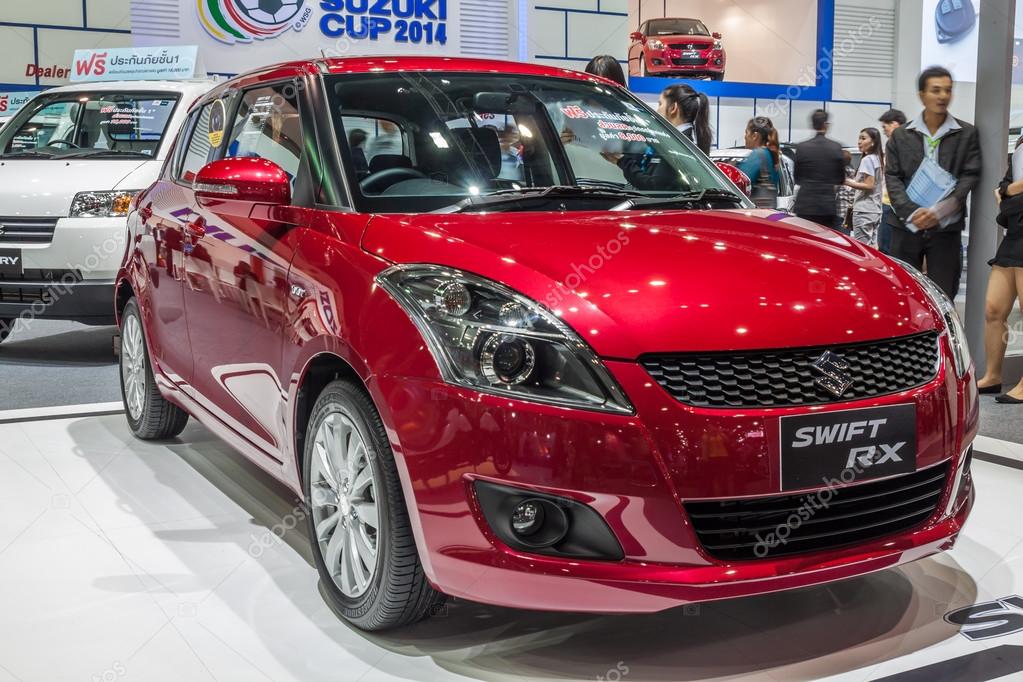 NONTABURI, THAILAND - 4 DEC : Suzuki Swift RX a compact car showed in 31th Thailand International Motor Expo on 4 December 2014