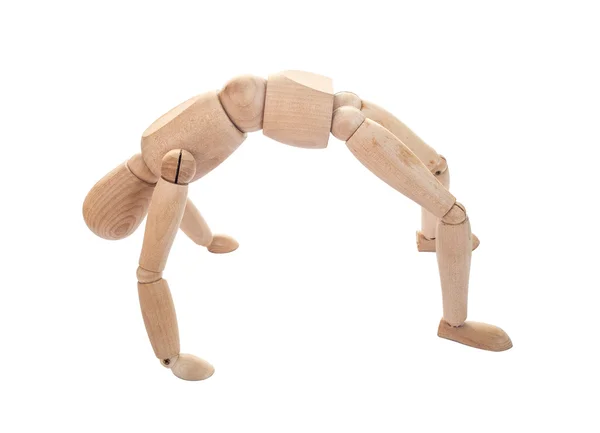 Isolated wooden figure on back bend pose — Stock Photo, Image