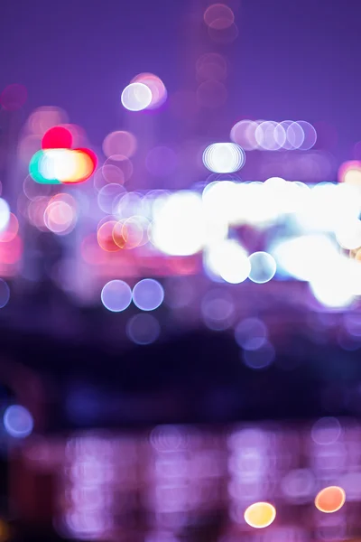 Bokeh y desenfoque del paisaje urbano por la noche —  Fotos de Stock