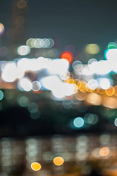 Bokeh y desenfoque del paisaje urbano por la noche —  Fotos de Stock