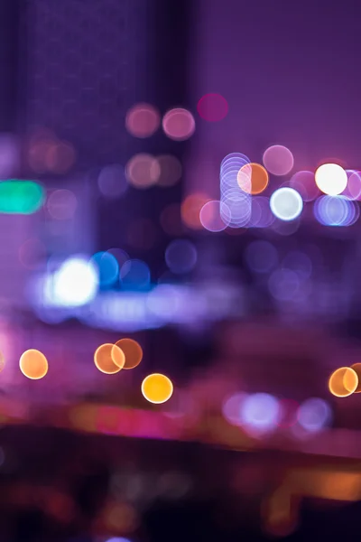 Bokeh y desenfoque del paisaje urbano por la noche —  Fotos de Stock