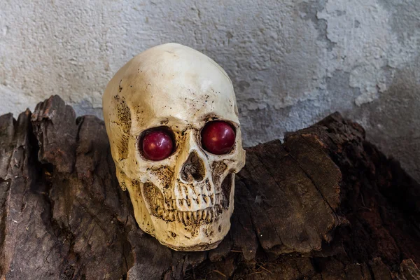 Human skull with red eye — Stock Photo, Image