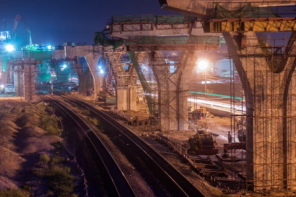 Express way construction site over railway at twilight in Bangkok, Thailand