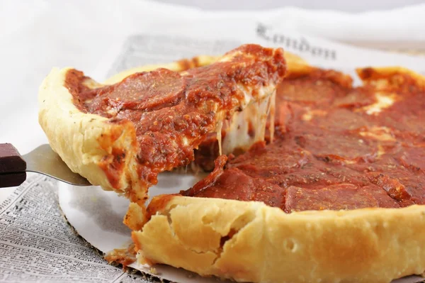 Deep dish pepperoni pizza Stock Photo