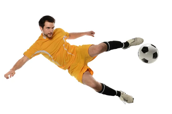 Futbolcu topa vuruyor — Stok fotoğraf