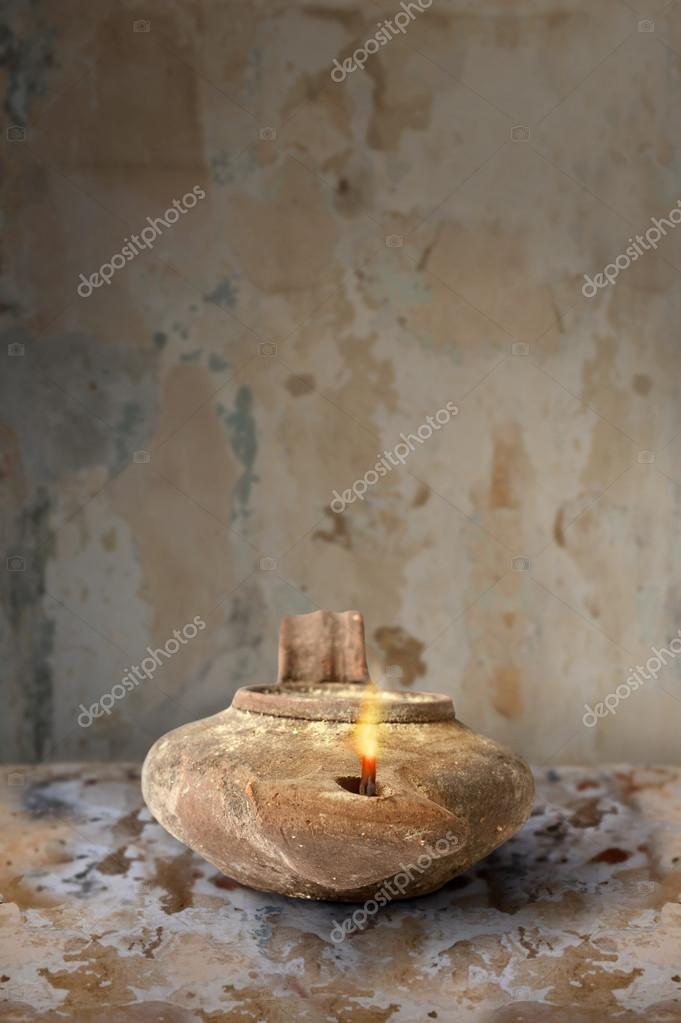 Ancient Middle Eastern Oil Lamp Stock Photo Ginosphotos1 123303084 Ancient Middle Eastern Oil Lamp On Clay Surface Photo By Ginosphotos1